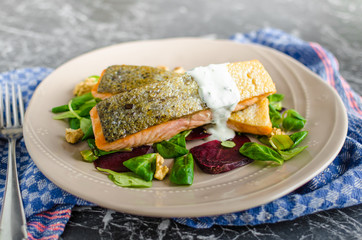 Fried salmon with herbs and beets