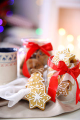 Christmas cookies and cup of tea, on table at home