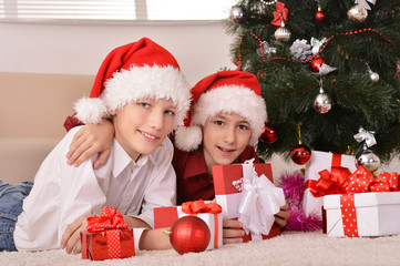 Fototapeta na wymiar Happy kids celebrating christmas
