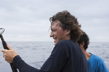 Fototapeta premium A man catching a big fish