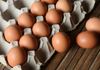 Eggs in trays made of paper.