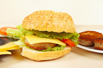 Great flavorful hamburger with cheese close up