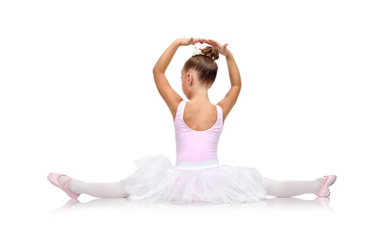 Fototapeta ballerina in tutu sitting on floor