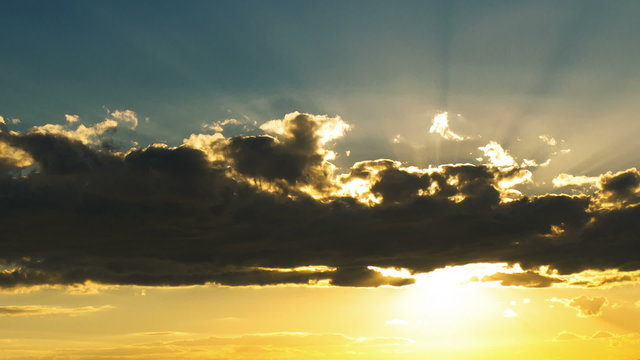 inspiring golden sunset sky timelapse sun shining rays through clouds