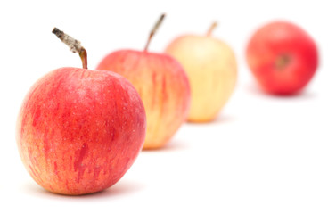 Four apples on a white background