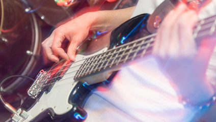 Fototapeta premium aggressive play guitar on stage