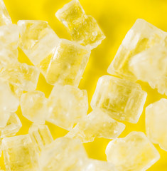Sugar on a yellow background. super macro
