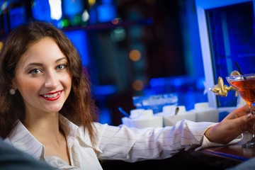 young woman in a bar