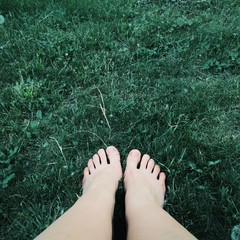 bare feet on the grass