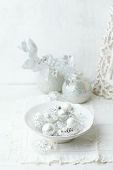 Fototapeta na wymiar Vintage Christmas decorations in white