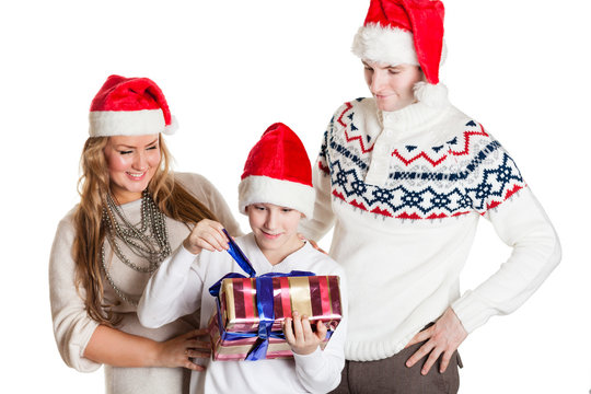 Happy family with gift box. Christmas.