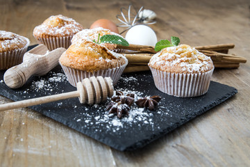 Homemade muffins with star anise, cinnamon and mint