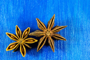 Fototapeta premium Star anise on wooden background