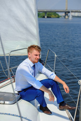 Businessman on a yacht