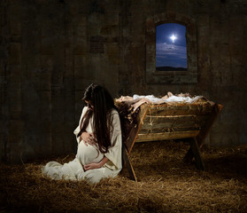 Pregnant Mary Leaning on Manger - 95882558