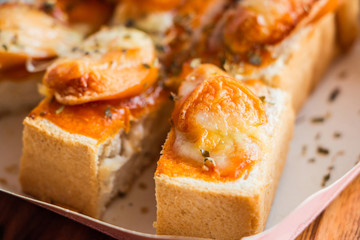 Toast homemade pizza split slices are good.Selective focus used.