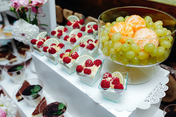 Delicious fancy wedding cake and fruit