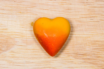 Fancy chocolate on wooden background