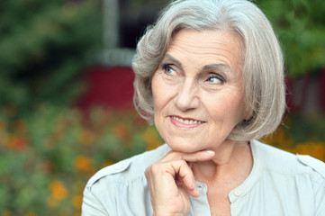 senior woman in summer park