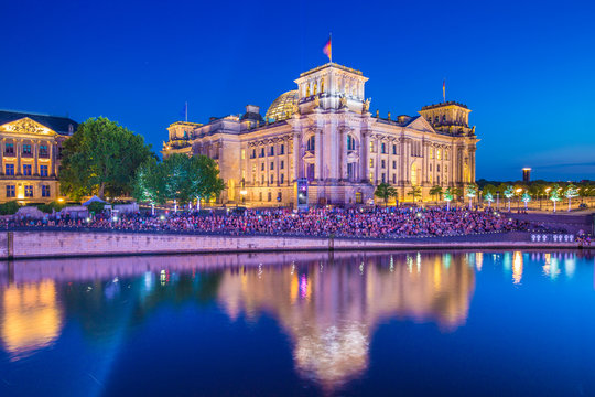 Berlin Reichstag building with Spree river at dusk, Berlin, Germany