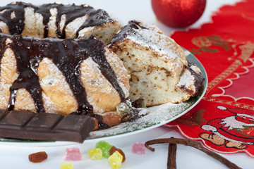 Slice of Christmas cake with decoration ball
