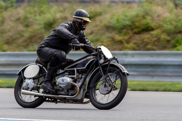 Obraz na płótnie Canvas historical motorcycle in the Masaryk circuit Brno