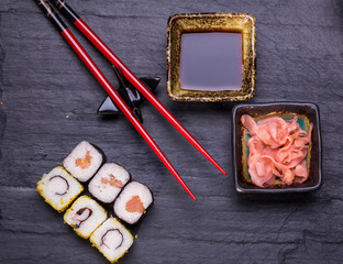 Closeup of fresh sushi on rustic wooden table