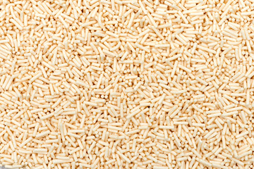 White chocolate chips as an abstract background texture