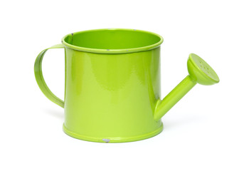 Gardening: little green watering can, isolated on white backgrou