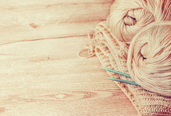 balls of yarn and knitting needles (Toning)