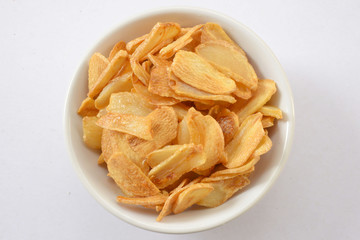 Garlic sliced and fried in oil.