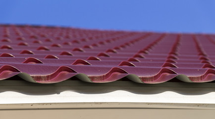 red metal roof tiles