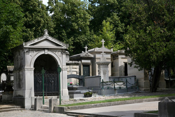 Fototapeta na wymiar European cemetery with large family crypts