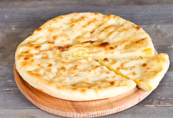 Ossetian pie with cheese and potatoes