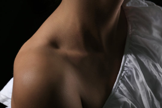 View on woman's neck, collarbone and shoulder, close-up
