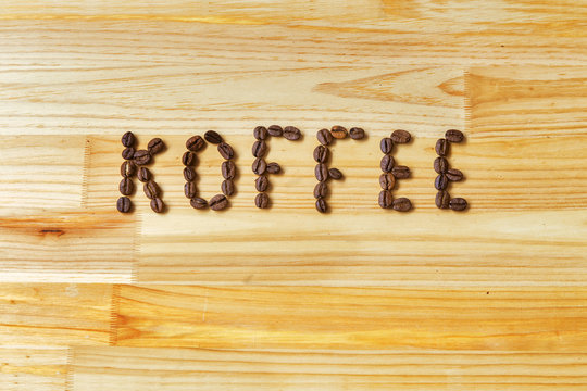 Fototapeta inscription from grains of coffee.