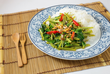 quick-fried water spinach with chili, soy sauce and rice