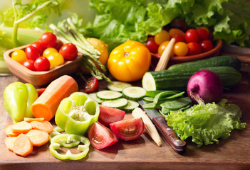Naklejka na ściany i meble fresh vegetables on cutting board