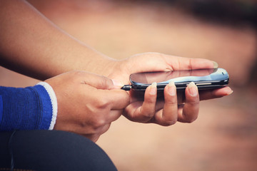Hand with listening to music on earphone