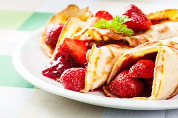 Traditional crepes served with strawberries
