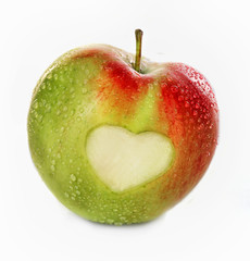 Apple with heart isolated on white