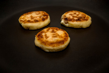 cheese pancakes in a pan