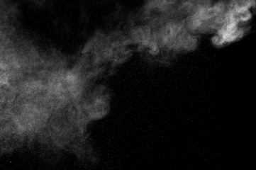 abstract white dust explosion  on a black background. abstract white powder. design elements. abstract texture.