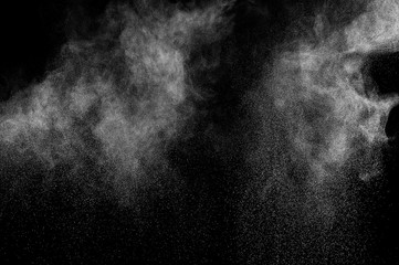 Fototapeta na wymiar abstract white dust explosion on a black background. abstract white powder. design elements. abstract texture.
