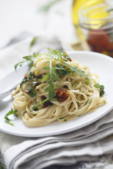 Arugula and sundried tomatoes pasta