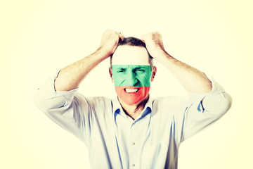 Mature man with Bulgaria flag on face.