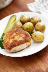 Chicken cutlet with baby potatoes