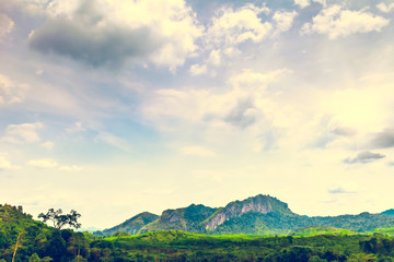 Fototapeta na wymiar Mountains and cloudy sky in Thailand