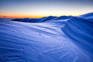 Mountain crusty snow ridge sunset
