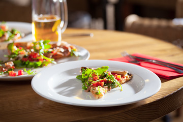 Delicious appetizer on white plate